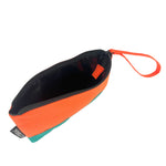 Compact and stylish duo-color pouch with a convenient wrist strap for handkerchief storage.
